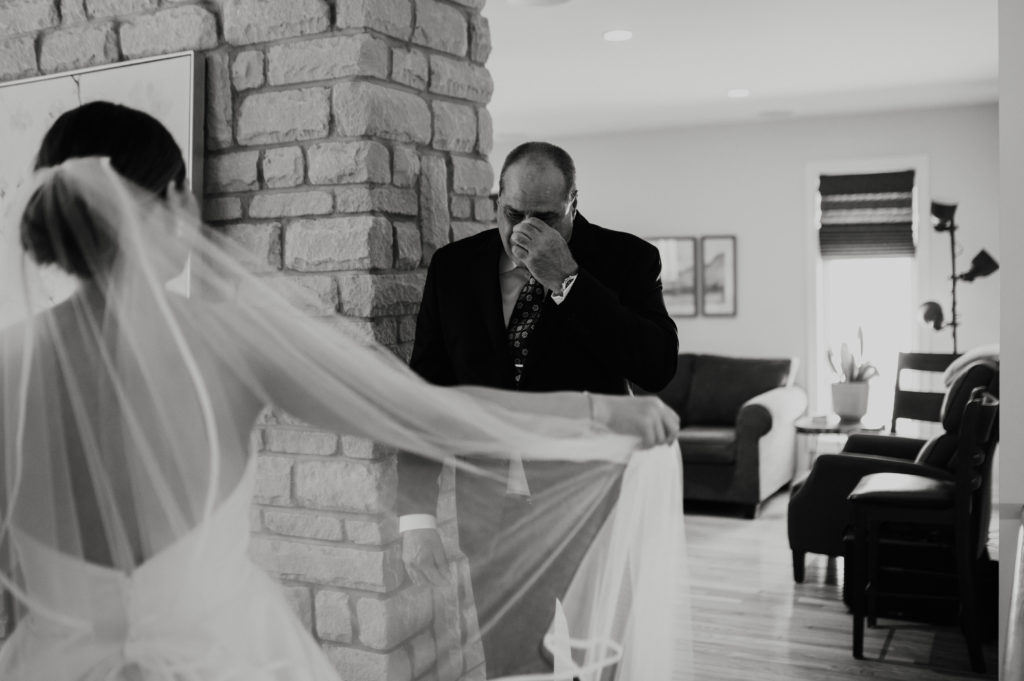 Emotional moment between bride and father of the bride