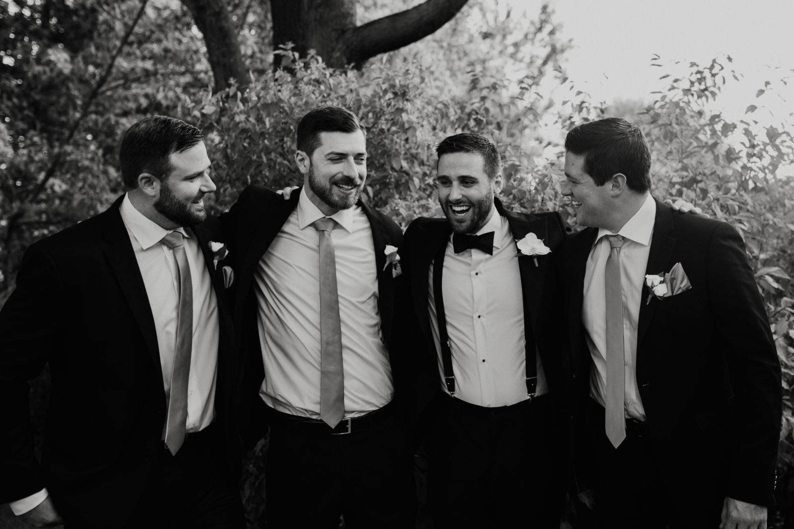Candid wedding day of groom and his best men