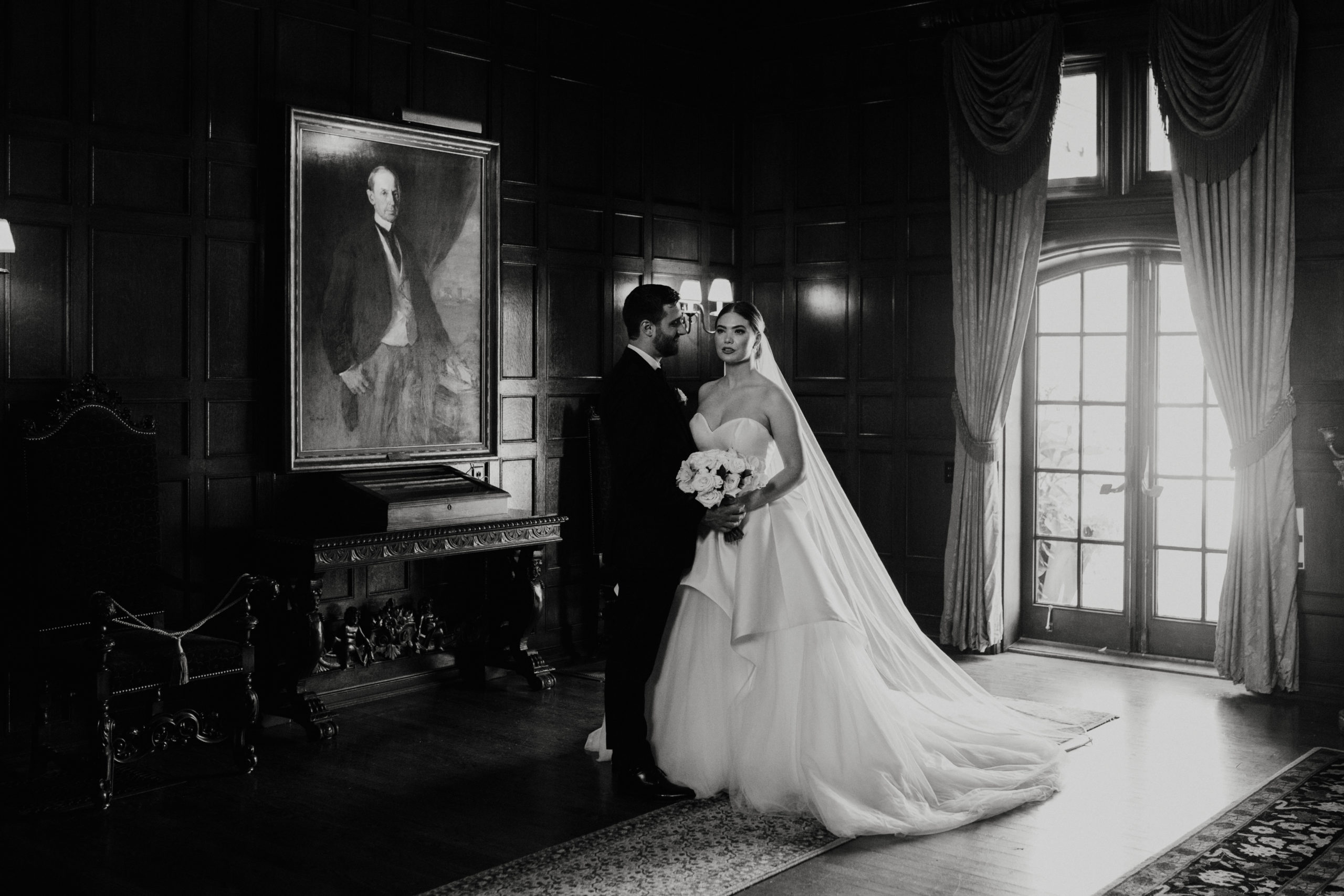 Regal surrounding of bride and groom inside Willistead Manor